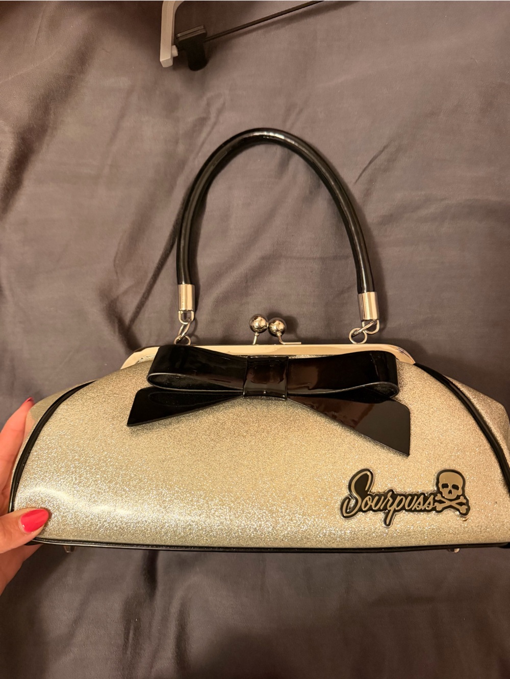 Sourpuss glitter clasp shoulder bag
